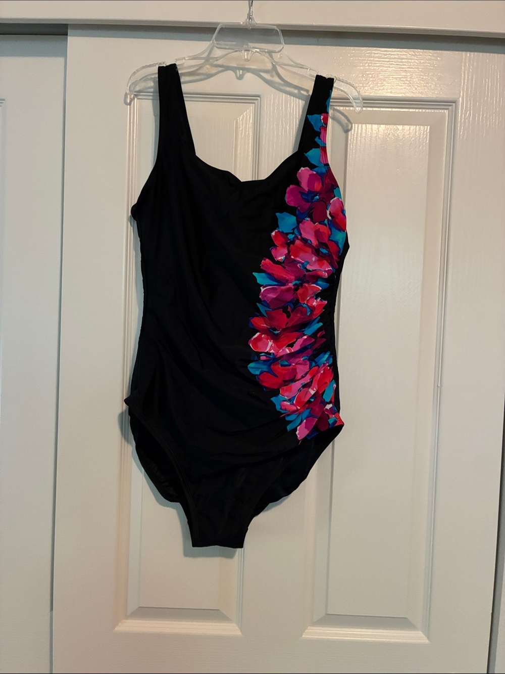 Black Women’s One-Piece Swimsuit with Pink Floral Accent